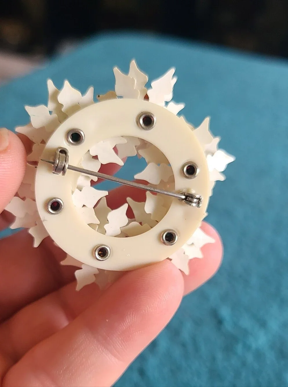 Festive Vintage Ivory Poinsettia Wreath Brooch with Multicolor Beads